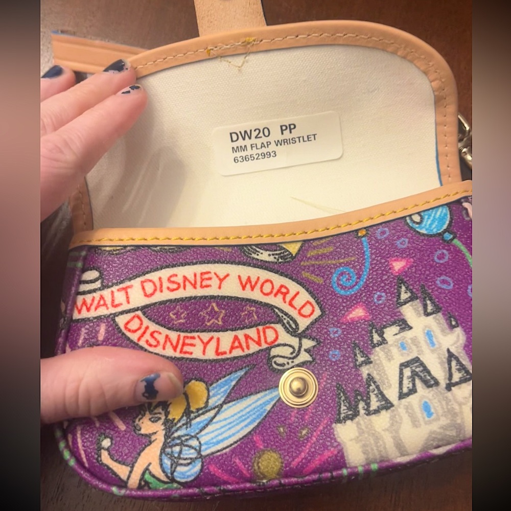 RARE PURPLE! NEVER EVER USED, DOONEY & BURKE WALT DISNEY WRISTLET.